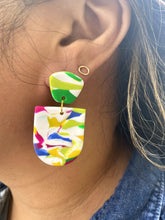 Load image into Gallery viewer, Ezrah wearing Barcelona Marbled Arched Door on left ear Barcelona Marbled Arched Door 1 L x 0.125 W x 1.75 H 18K Gold Plated Surgical Steel Earring Posts Silicone backings by Pinwheel Clay
