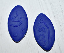 Load image into Gallery viewer, Cape Town Oval Stud - Blue Texture  0.8125 L x 0.125 W x 1.5 H 18K Gold Plated Surgical Steel Earring Posts Silicone backings flat lay by Pinwheel Clay
