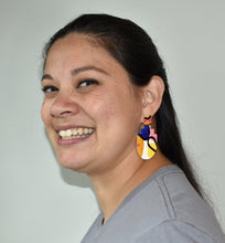Load image into Gallery viewer, Maggie wearing Cape Town Tiered Arch on left ear Cape Town Tiered Arch  2.25 L x 0.125 W x 2.5625 H 18K Gold Plated Surgical Steel Earring Posts Silicone backings by Pinwheel Clay

